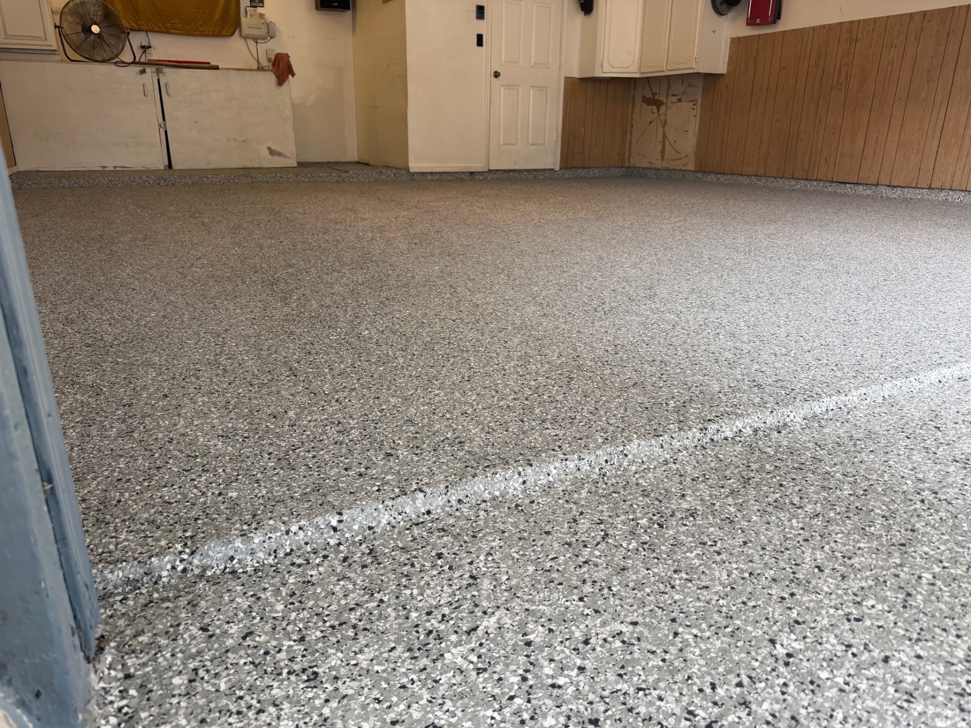 Close-up of a finished flake garage floor